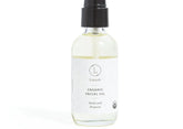 Lizush Organic Facial Oil in a clear bottle, seals and protects all skin types, 2 fl oz.