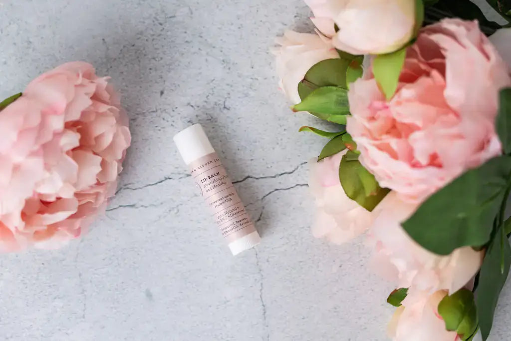 Lavender luxury gift box item with pink peony flowers on a textured background, evoking calm and self-care.