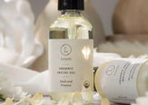Lizush organic facial oil bottle, 2 fl oz, seals and protects, USDA certified organic, for all skin types.