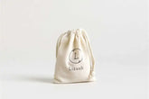 Eco-friendly canvas bag with Lizush logo, perfect for storing skincare products.