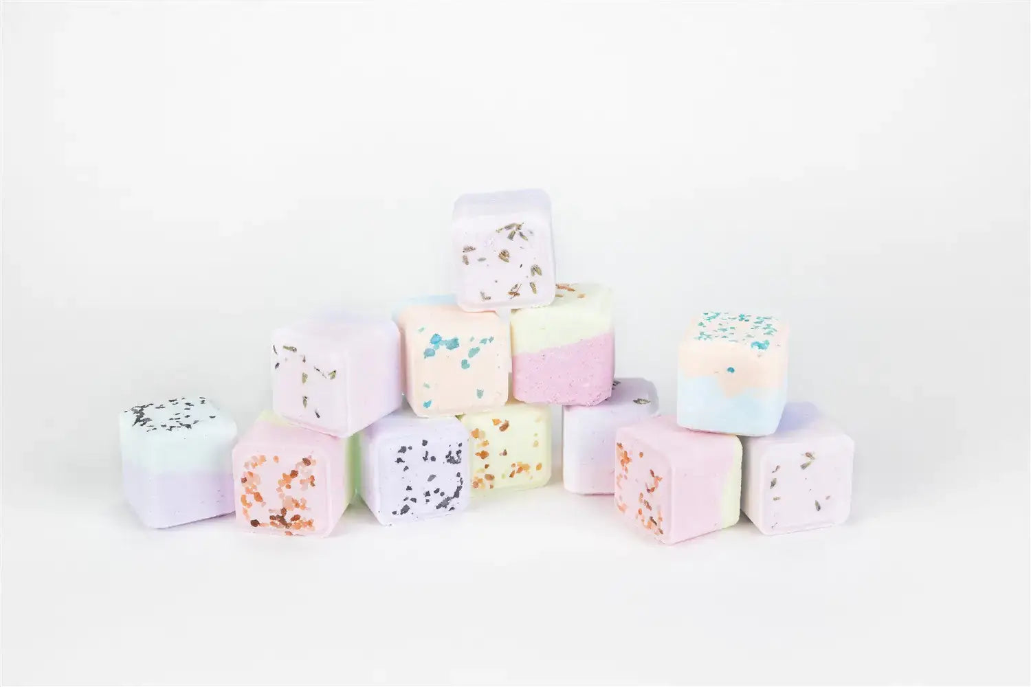 Colorful lavender bath cubes stacked for a soothing bath experience.