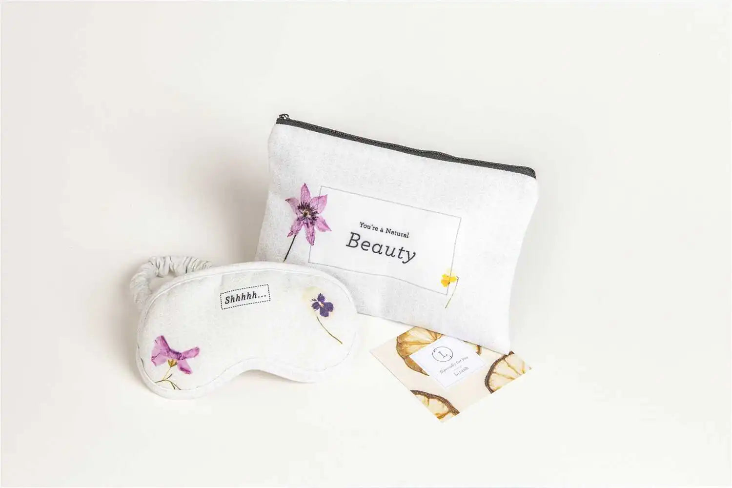 Lavender eye mask and beauty pouch in a luxury gift box, perfect for self-care and relaxation.